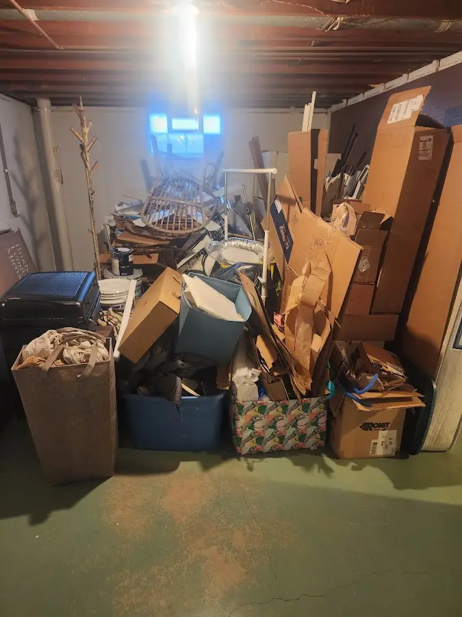 Roll-off dumpster container at job site for Cleanout Dumpster Rental in Violet